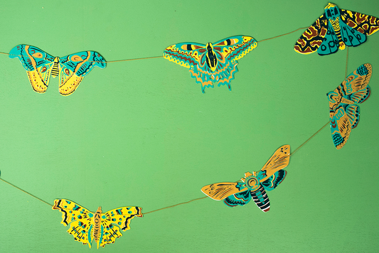 Genähte Mottengirlande