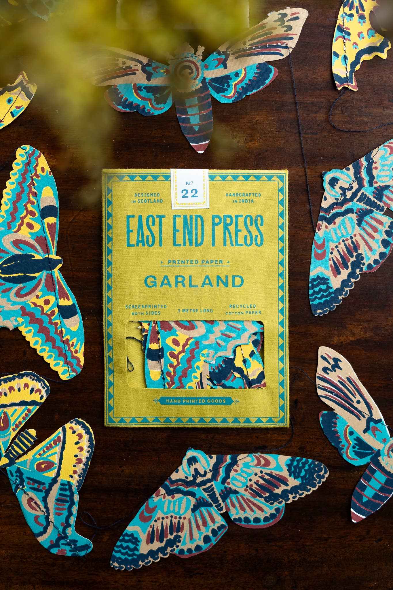 Genähte Mottengirlande